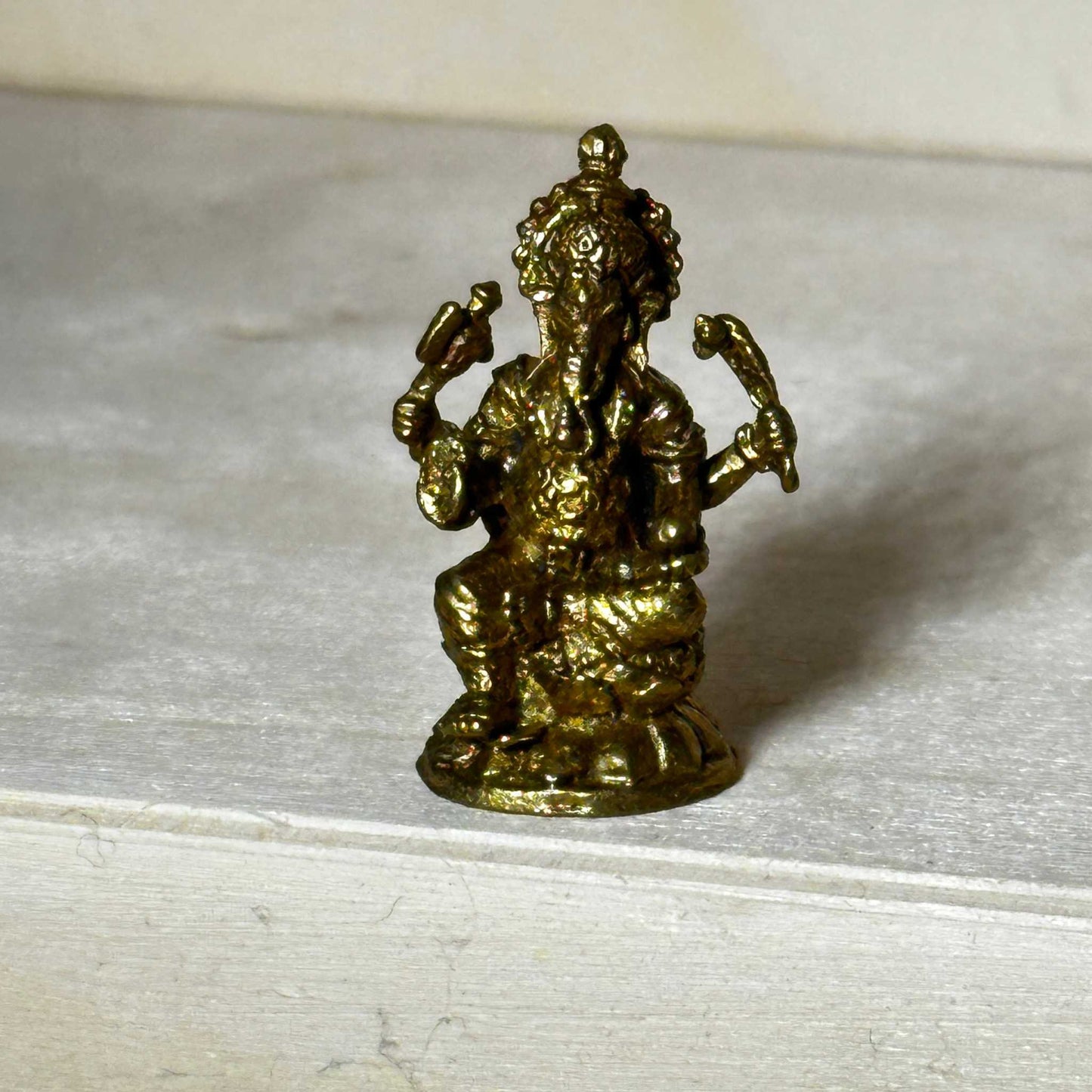 Estatuillas de latón de bolsillo
