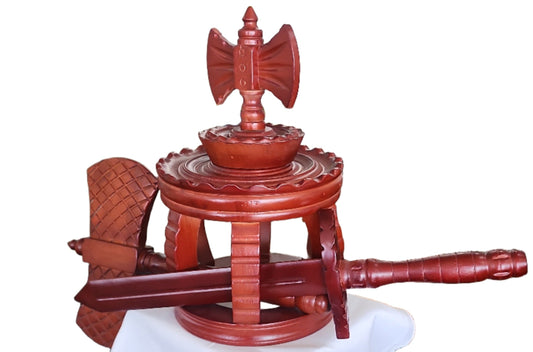 WOODEN CROWN WITH AXE AND SWORD
