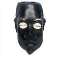 Eleggua pintado de negro