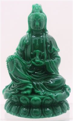 Diosa Kwan Yin sentada en una flor de loto