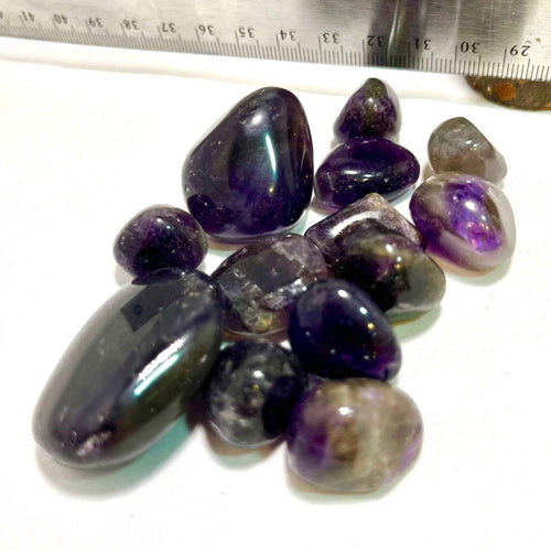 Piedra de bolsillo de amatista pulida