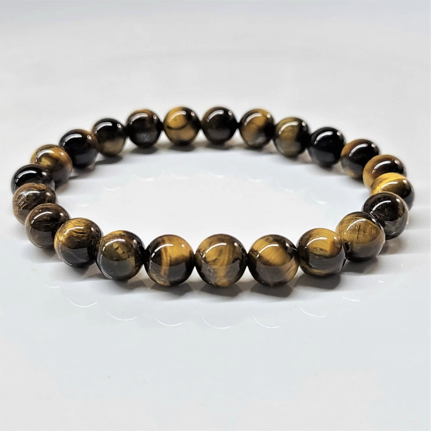 Pulsera de Cuentas Redondas de Ojo de Tigre - Confianza Arraigada