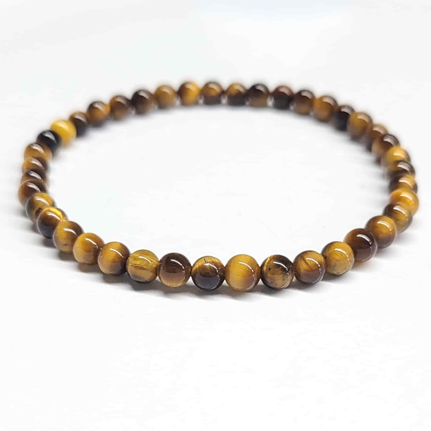 Pulsera de Cuentas Redondas de Ojo de Tigre - Confianza Arraigada