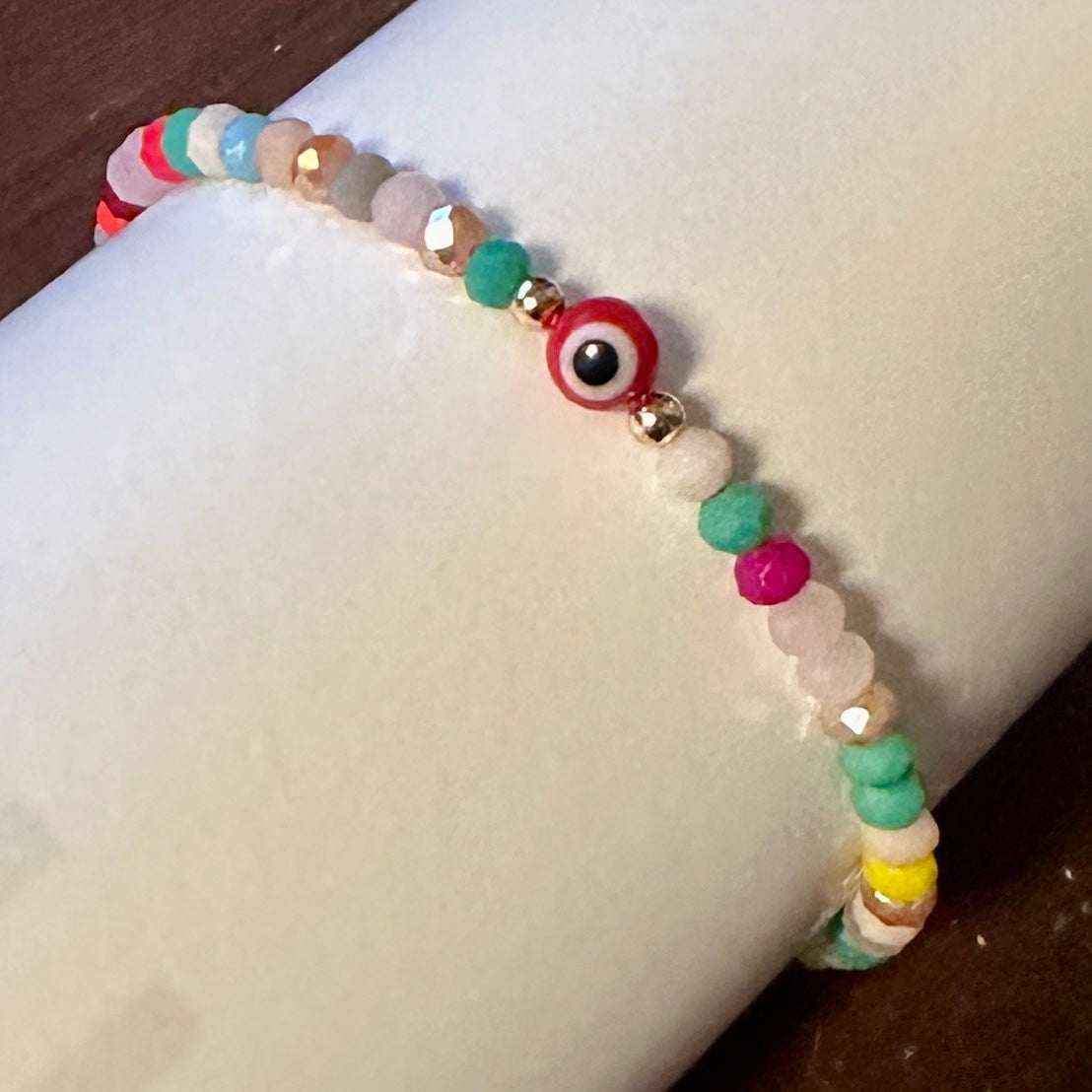 Pulsera protectora - Ojo turco con cuentas facetadas de hilo rojo