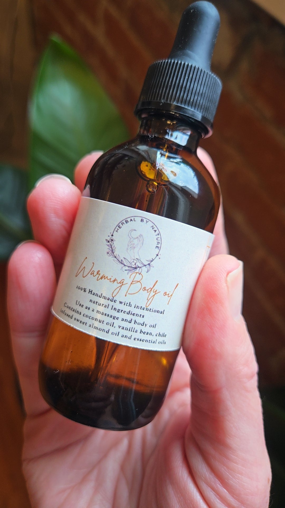 Aceite corporal y de masaje infusionado con hierbas/vainilla, efecto calor