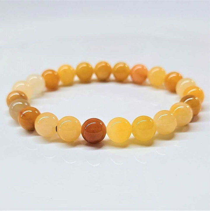 Pulsera de cuentas redondas de jade amarillo - Alegría valerosa